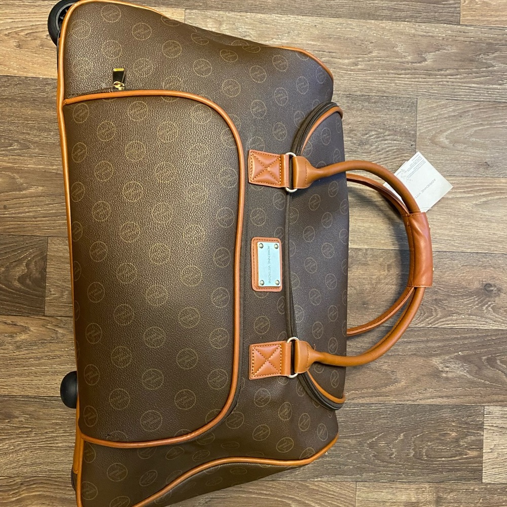 Adrienne Vittadini Duffel on wheels. NWT